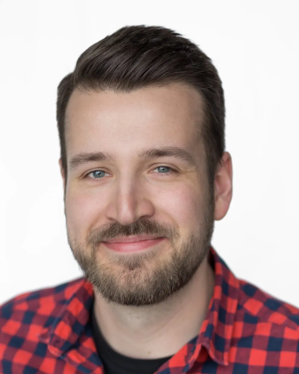 Ondrej Vatka, product designer, photographed against a light background.
